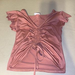 Cute pink crop top tie in front